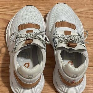 On Running White and Tan Sneakers